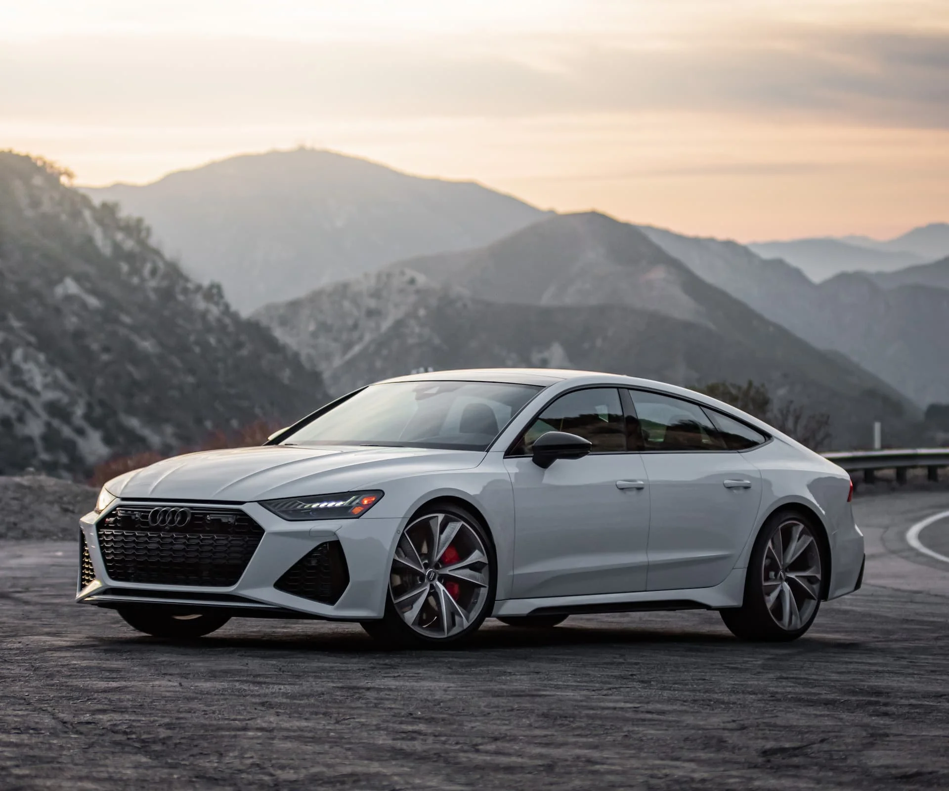 A white Audi RS5 Parked On Mountaintop Road